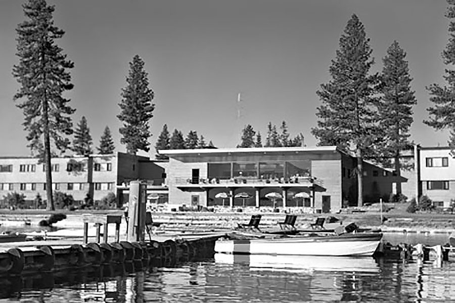 Black and white photo of Shore Lodge and its docks, years ago